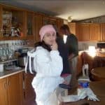 Carla is getting ready to help collect honey. Carla is getting ready to help collect honey.